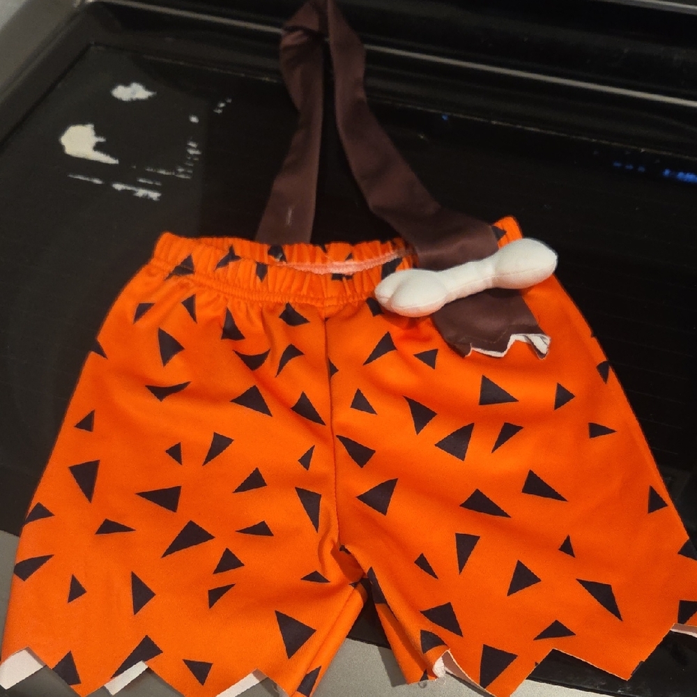 Kids Orange Cave-Style Halloween Shorts with Brown Bone Accent